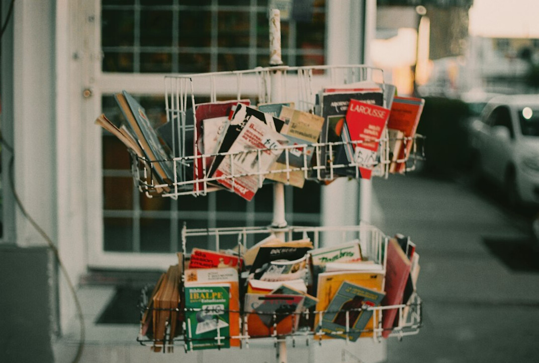 Stack of newspapers and press materials